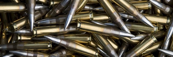 A pile of bullets sitting next to each other.